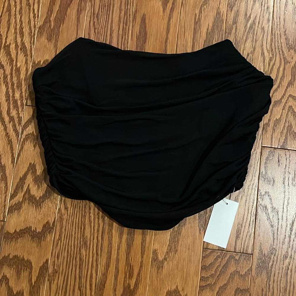 Black sleeveless corset with ruching